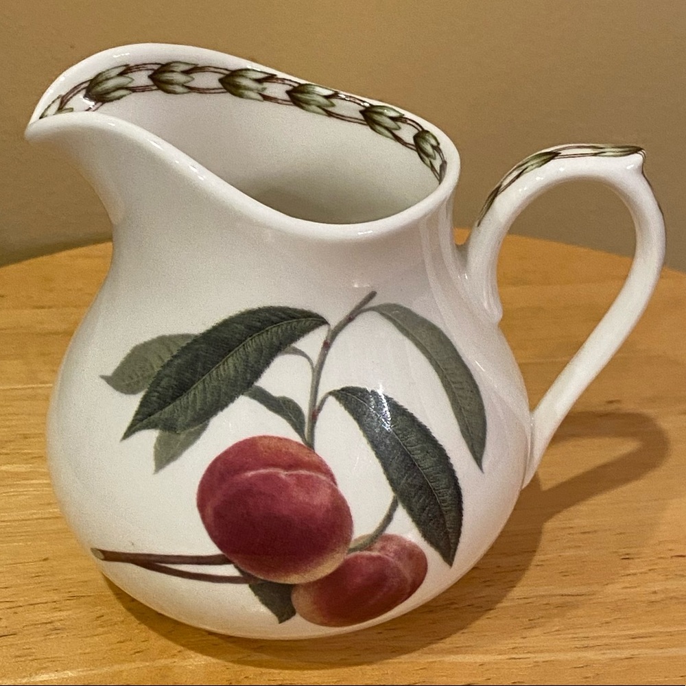 Queen’s fine bone China creamer made in India.